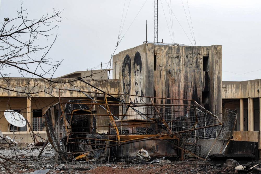 This picture taken on November 26, 2022 shows a view at damage sustained at the headquarters of the Kurdistan Democratic Party of Iran (KDPI) following an Iranian cross-border attack in the town of Koye (Koysinjaq), in the east of Arbil district in the autonomous Kurdish region of northern Iraq. — AFP pic