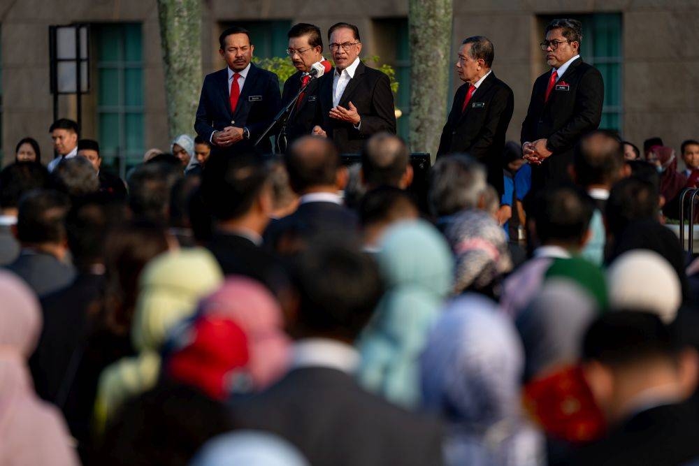 Prime Minister Datuk Seri Anwar Ibrahim addresses staff at the Prime Minister’s Department in Putrajaya November 29, 2022. — Picture by Sadiq Asyraf/ Prime Minister’s Office