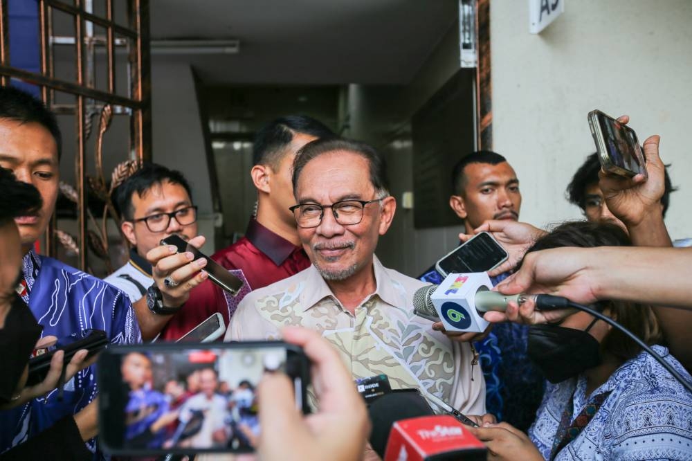 Pakatan Harapan chairman Datuk Seri Anwar Ibrahim speaks to media at the PKR headquarters in Petaling Jaya November 28, 2022. ― Picture by Ahmad Zamzahuri