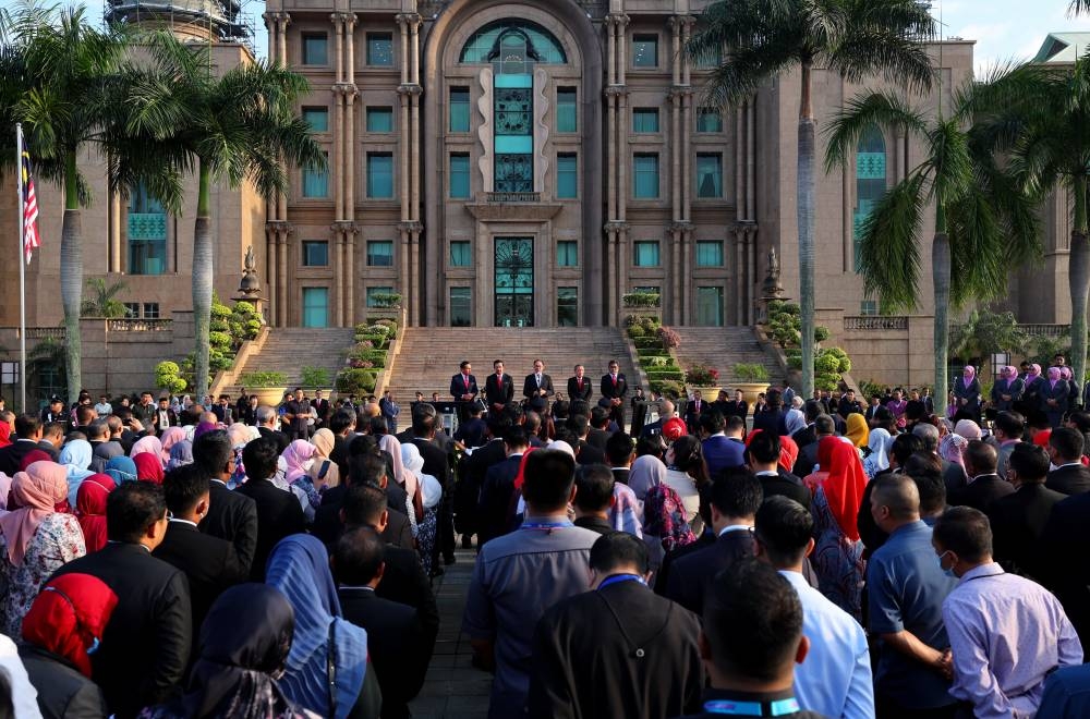 Prime Minister Datuk Seri Anwar Ibrahim addresses staff at the Prime Minister’s Department in Putrajaya November 29, 2022. — Bernama pic