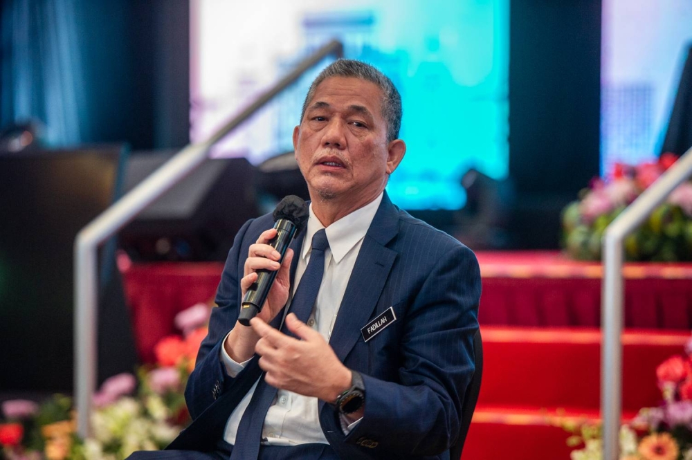 File picture shows then-Minister of Works, Datuk Seri Fadillah Yusof speaking to reporters after attending the special retreat in conjunction with 'Setahun Malaysia Prihatin' at PICC, in Putrajaya, March 1, 2021. — Picture by Shafwan Zaidon