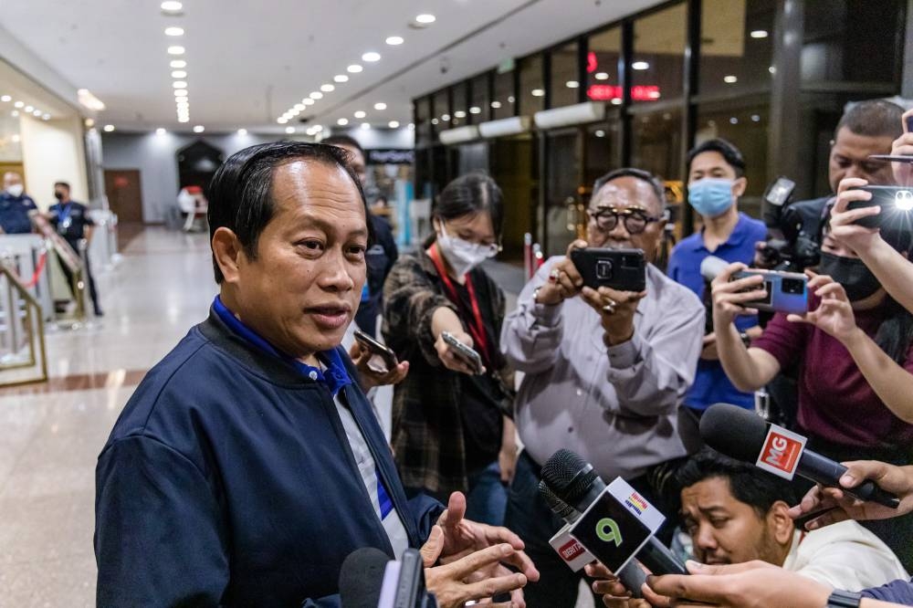 Umno secretary-general Datuk Seri Ahmad Maslan speaks to members of the media at the party’s headquarters in Kuala Lumpur October 6, 2022. — Picture by Firdaus Latif