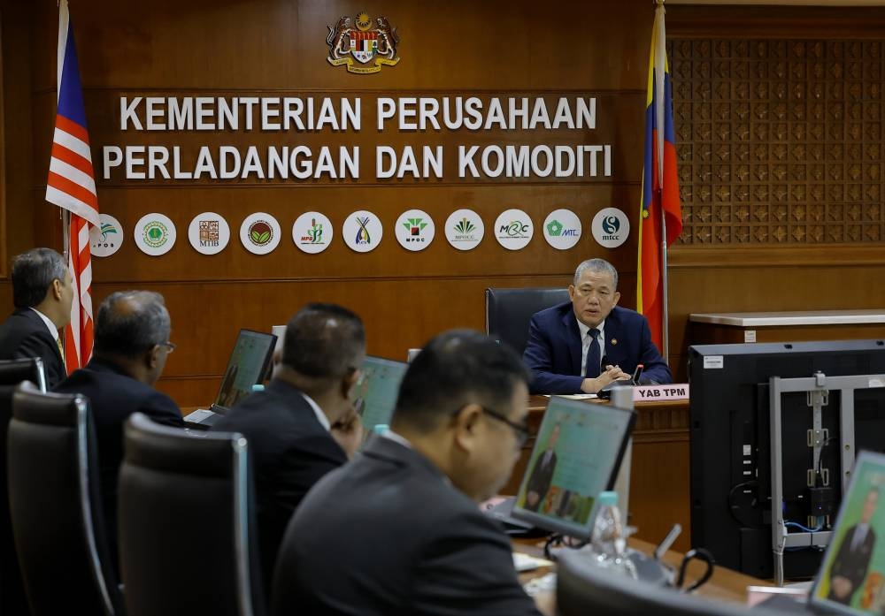 Plantation and Commodities Minister Datuk Seri Fadillah Yusof, who is also Deputy Prime Minister, attends a briefing session on the ministry with the department heads, in Putrajaya December 5, 2022. — Bernama pic