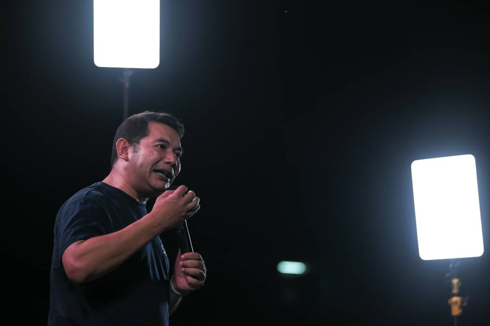 Minister of Economy Rafizi Ramli stumps for Pakatan Harapan’s Padang Serai candidate Mohamad Sofee Razak at the PH and BN mega ceramah in Kampung Tunku Putra, Kelang Lama, December 5, 2022. — Bernama pic 