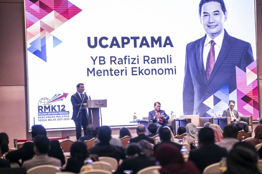 Minister of Economic Affairs, Rafizi Ramli speaks at the Kick-Off Conference at the Everly Hotel, Putrajaya December 6, 2022. — Picture by Hari Anggara