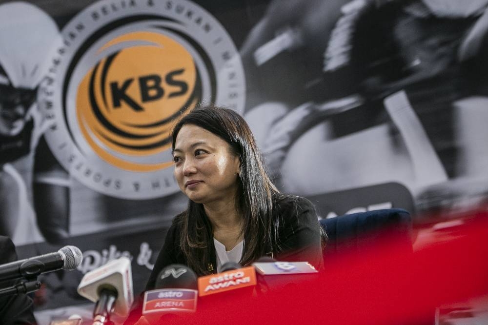 Youth and Sports Minister Hannah Yeoh speaks to the media after clocking in at Ministry of Sports in Putrajaya December 6, 2022. — Picture by Hari Anggara