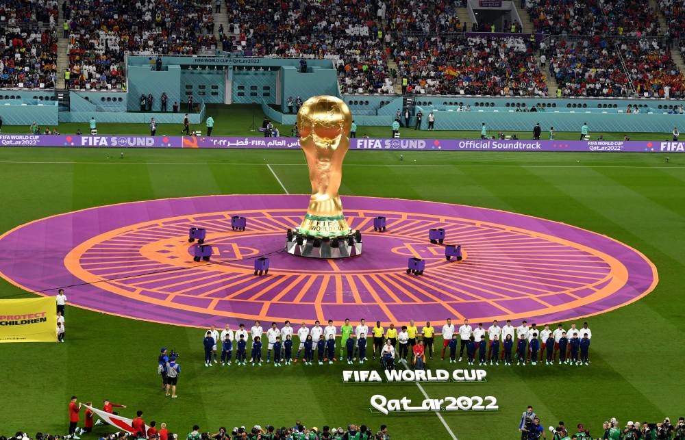 A giant replica World Cup trophy is seen before the match between Japan and Spain at the Khalifa International Stadium, Doha December 1, 2022. — Reuters pic