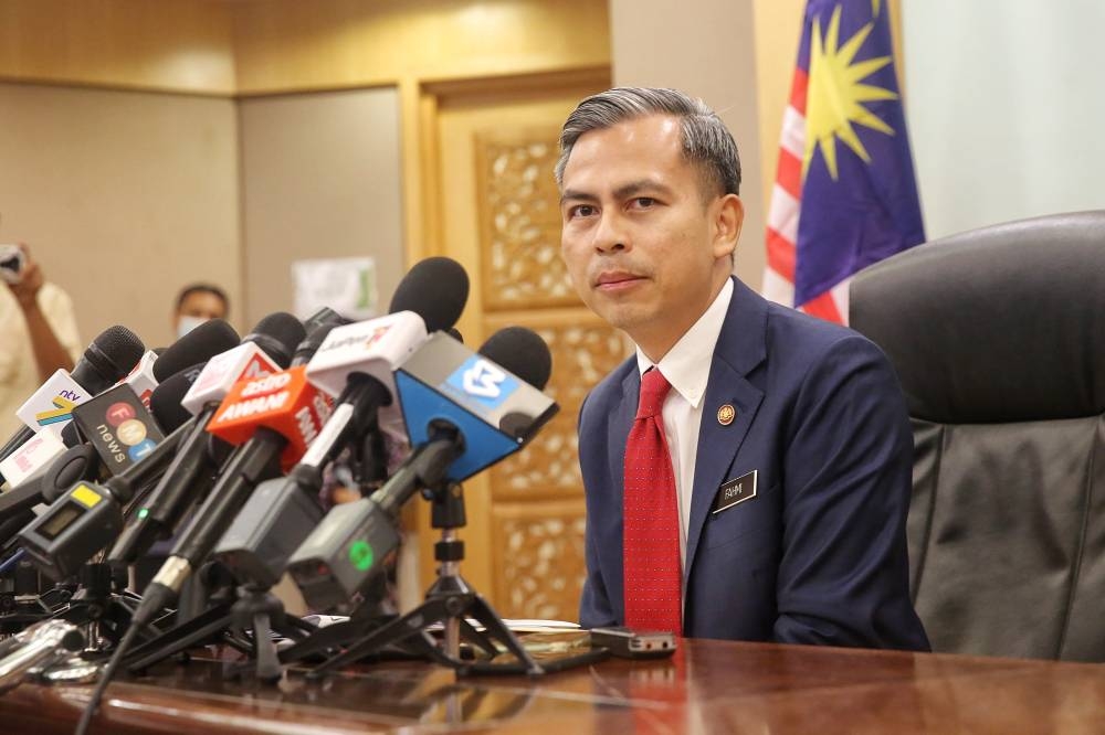 Communications Minister Fahmi Fadzil speaks during a press conference in Putrajaya December 7, 2022. — Picture by Choo Choy May