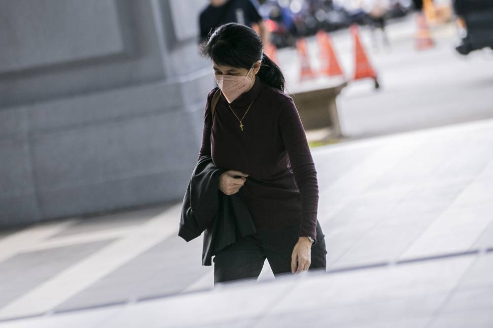 Former AmBank relationship manager Joanna Yu arrives at the Kuala Lumpur High Court December 5, 2022. ― Picture by Hari Anggara