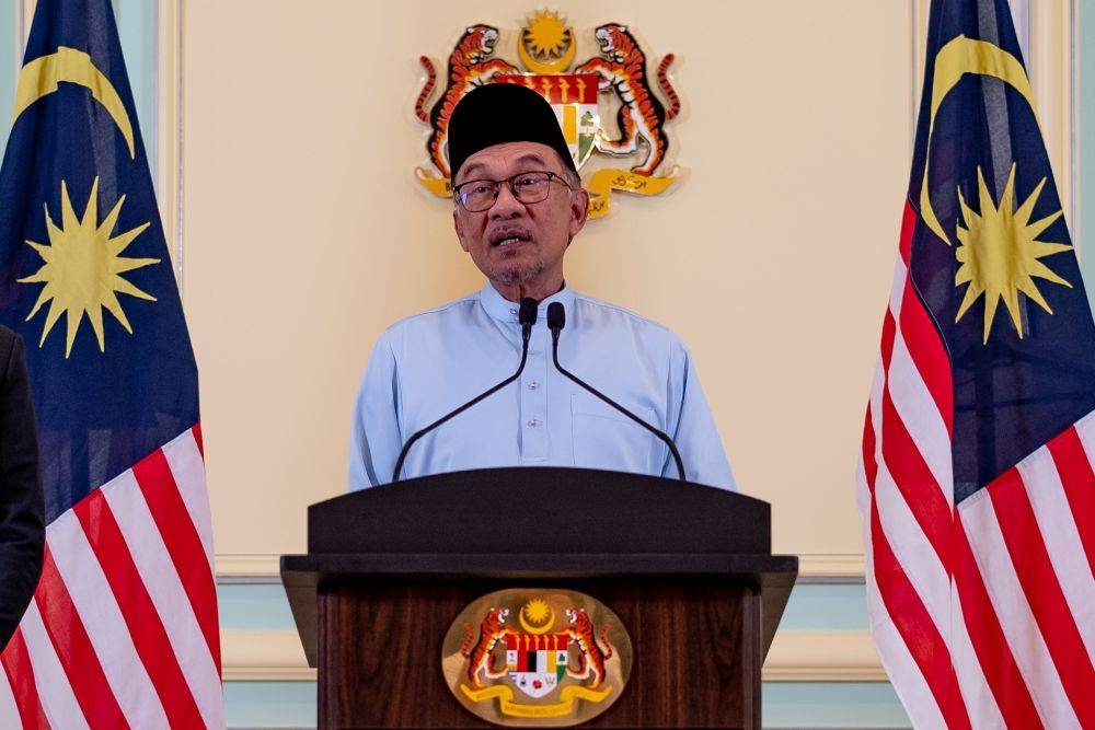 Prime Minister Datuk Seri Anwar Ibrahim speaks during a press conference in Putrajaya December 9, 2022. — Picture courtesy of the Prime Minister's Office/Afiq Hambali