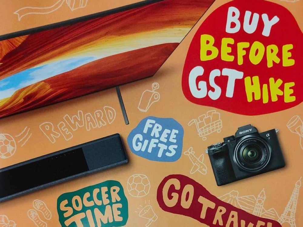 A brochure from an electronics brand reminding consumers of the Goods and Services Tax (GST) increase. — TODAY pic