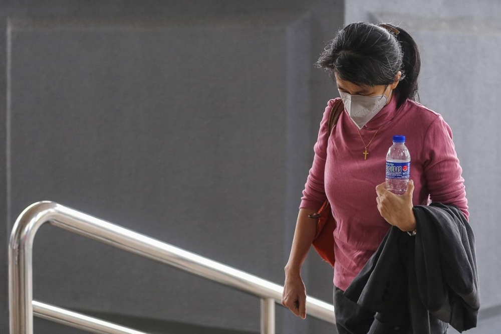 Former AmBank banker Joanna Yu arrives at Kuala Lumpur High Court, December 15, 2022. — Picture by Yusof Mat Isa