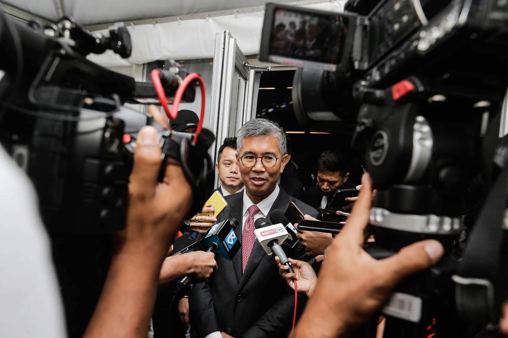 SUNGAI BESI 08/12/2022 Minister of International Trade and Industry Tengku Datuk Seri Zafrul Abdul Aziz  speaks to the press during the unveilling ceremony of the new Full Electric Vehicles here at Bandar Malaysia. PICTURE BY SAYUTI ZAINUDIN