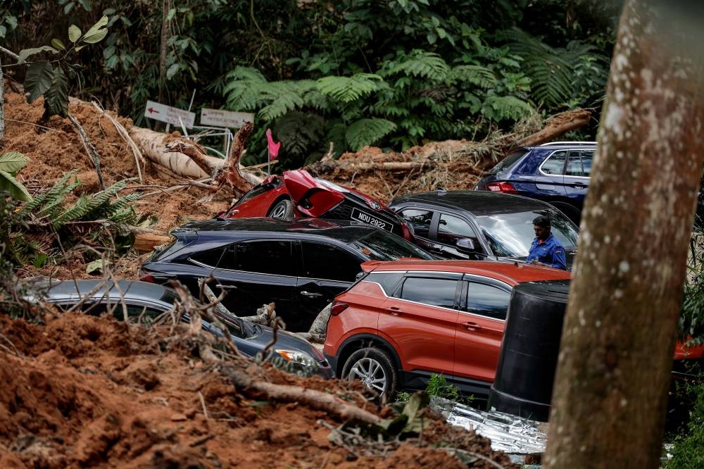 Vehicles belonging to the landslide victims pictured at the location near the campsite at Father’s Organic Farm, Batang Kali, December 16, 2022. — Bernama pic 