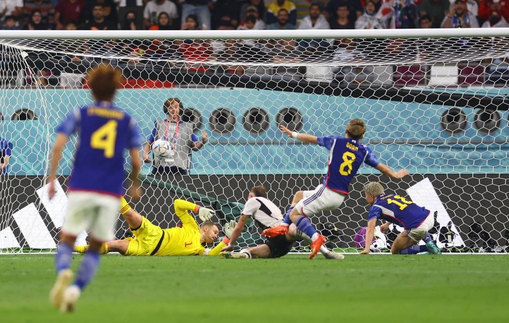 Japan’s Ritsu Doan scores their first goal against Germany during their Group E World Cup match at the Khalifa International Stadium in Doha, Qatar, November 23, 2022. — Reuters pic