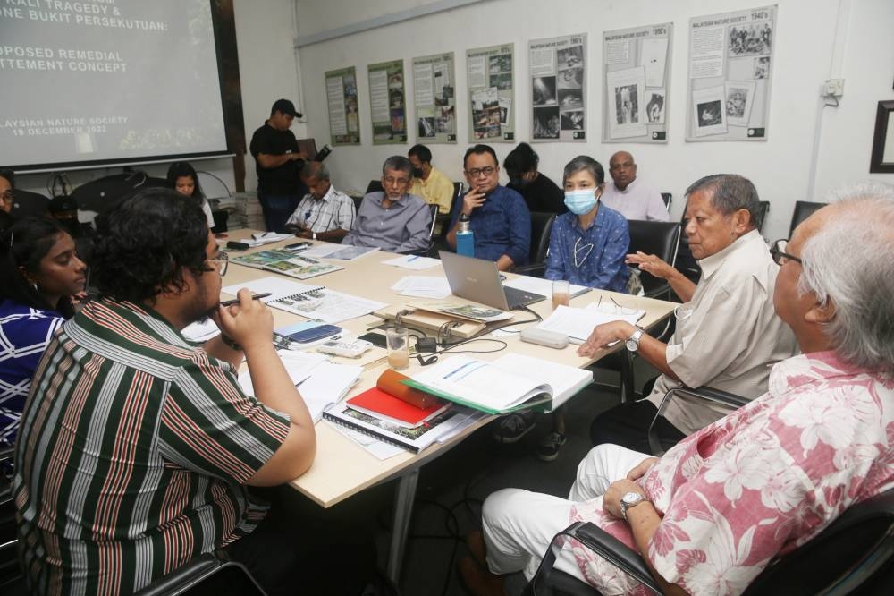 Malaysian Nature Society (MNS) senior adviser Tan Sri Salleh Mohd Nor (2nd right) speaks at the MNS press conference on the plans to gazette Bukit Persekutuan in Kuala Lumpur December 19, 2022. — Picture by Choo Choy May