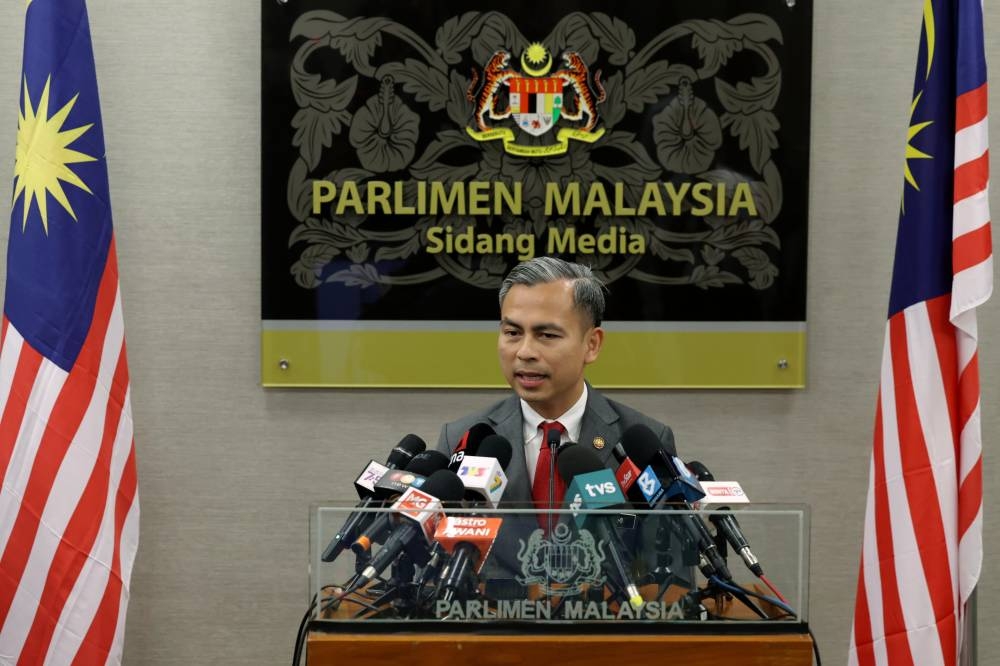 Communications and Digital Minister Fahmi Fadzil speaks during a press conference after the First Session of the 15th Parliament in Parliament House, Kuala Lumpur December 19, 2022. — Bernama pic