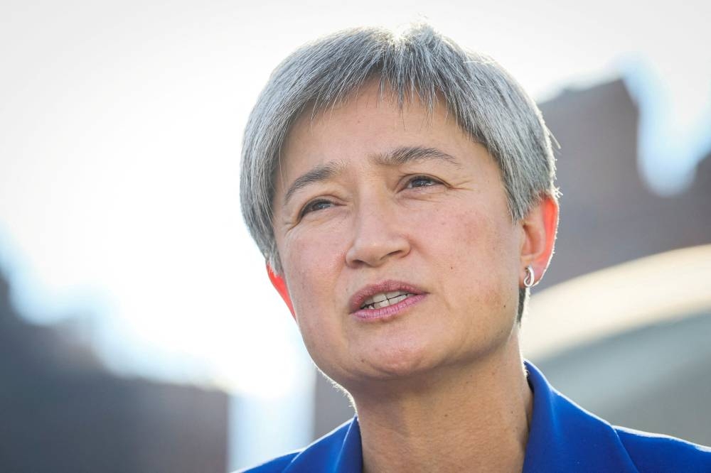 Penny Wong (pic) is expected to meet Wang Yi in Beijing tomorrow, the first visit by an Australian minister since 2019 and the first formal talks in Beijing between the two nations’ top diplomats since 2018. — Reuters pic