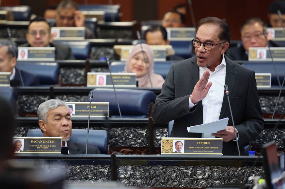 Prime Minister Datuk Seri Anwar Ibrahim addresses members of Parliament at Dewan Rakyat December 20, 2022. — Bernama pic