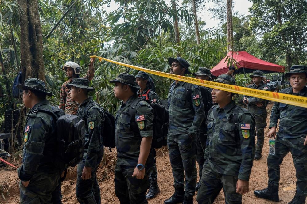 General Movement officers reporting for duty. — Picture by Shafwan Zaidon