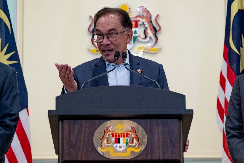 Prime Minister Datuk Seri Anwar Ibrahim speaks during a press conference after a Cabinet meeting in Putrajaya December 21, 2022. — Picture courtesy of the Prime Minister's Office