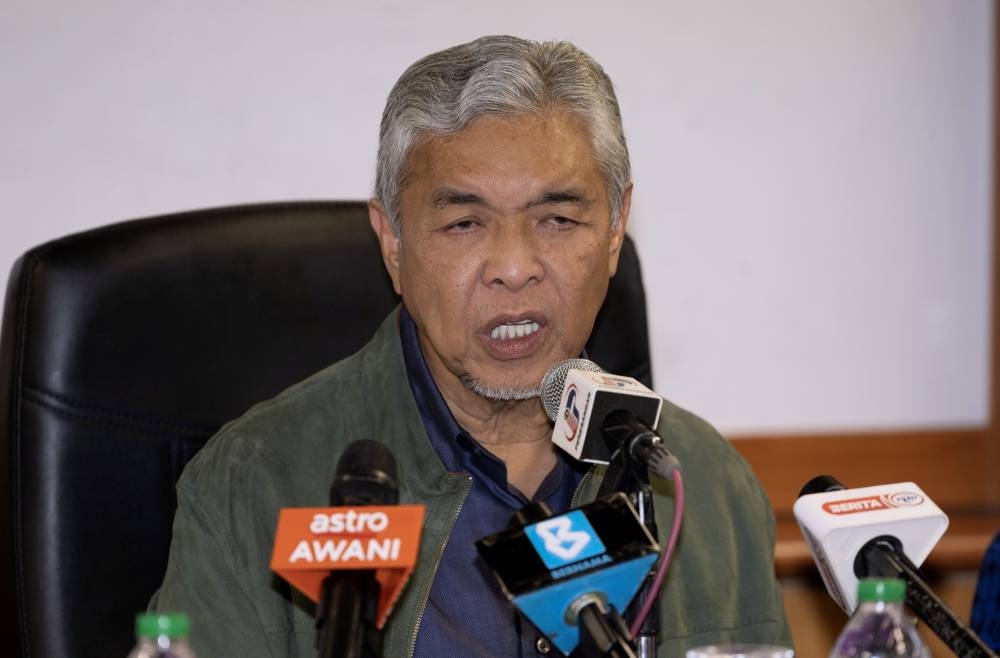 Umno president Datuk Seri Ahmad Zahid Hamidi said he will leave it up to party delegates to decide if the top two party positions should be open for challenge, including his own. — Bernama pic