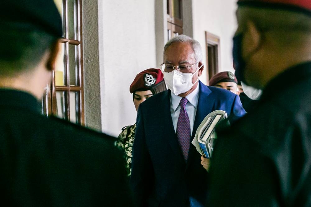 Former prime minister Datuk Seri Najib Razak leaves the Kuala Lumpur Court Complex December 22, 2022. — Picture by Hari Anggara