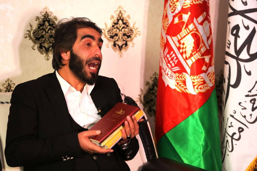 In this picture taken on December 30, 2022, Ismail Mashal, a lecturer of journalism at three universities, speaks during an interview with AFP in Kabul. — AFP pic