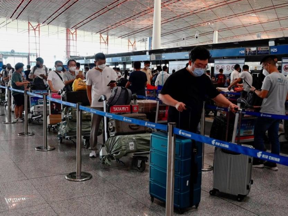 Earlier last week, it was reported that Sabah Covid-19 spokesman Datuk Seri Masidi Manjun said visitors travelling from China will have to provide a negative Covid-19 pre-departure test result taken up to 48 hours before entering Sabah from January 1. ― AFP pic