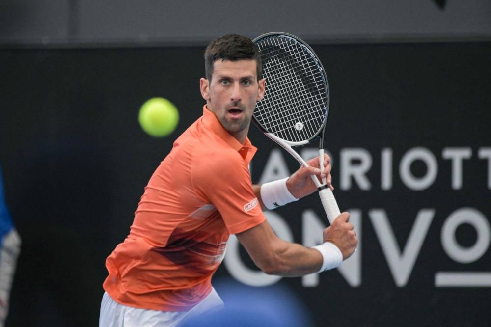 Serbian tennis player Novak Djokovic hits a return during his first round match against France's Constant Lestienne at the ATP Adelaide International tournament in Adelaide on January 3, 2023. — AFP pic