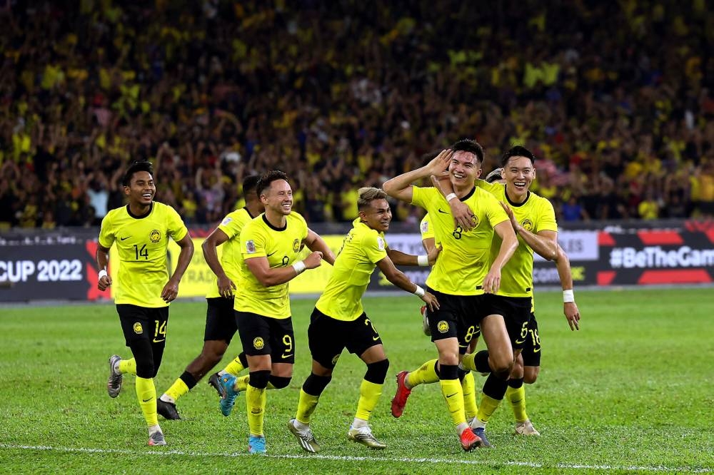 Stuart John Wilkin (second from right) celebrates with teammates after scoring against Singapore at the Bukit Jalil Stadium in Kuala Lumpur January 3, 2023. — Bernama pic