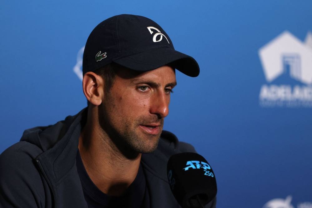 Serbia's Novak Djokovic speaks during a press conference after winning his second round match against France's Quentin Halys at the Memorial Drive Tennis Club in Adelaide January 5, 2023. — Reuters pic