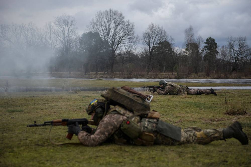 Ukrainian service members attend military exercises near the border with Belarus, amid Russia's attack on Ukraine, in Zhytomyr region, Ukraine January 4, 2023. — Reuters pic