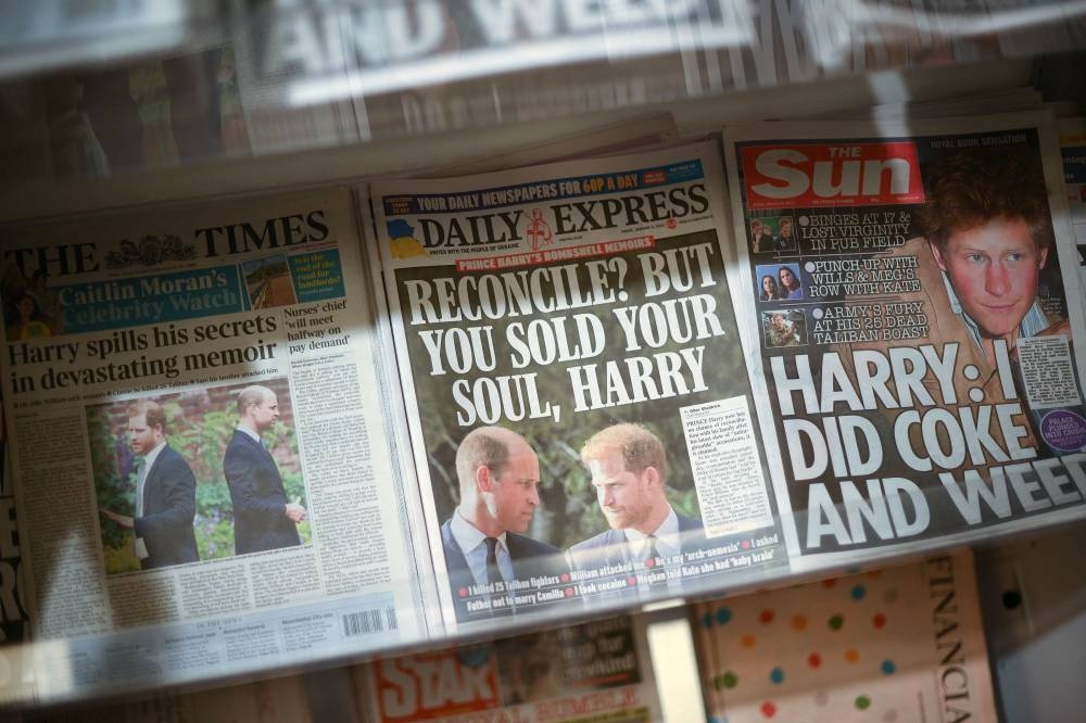 British daily newspaper, leading with stories about the publication of the book ‘Spare’ by Britain’s Prince Harry, Duke of Sussex, are pictured displayed for sale in London on January 6, 2023. — AFP pic