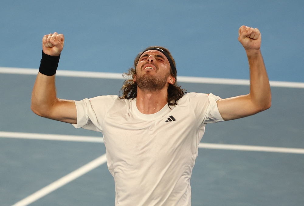 Greece’s Stefanos Tsitsipas celebrates winning his fourth round match against Italy’s Jannik Sinner during the Australian Open at Melbourne Park, Melbourne, January 22, 2023 ― Reuters pic