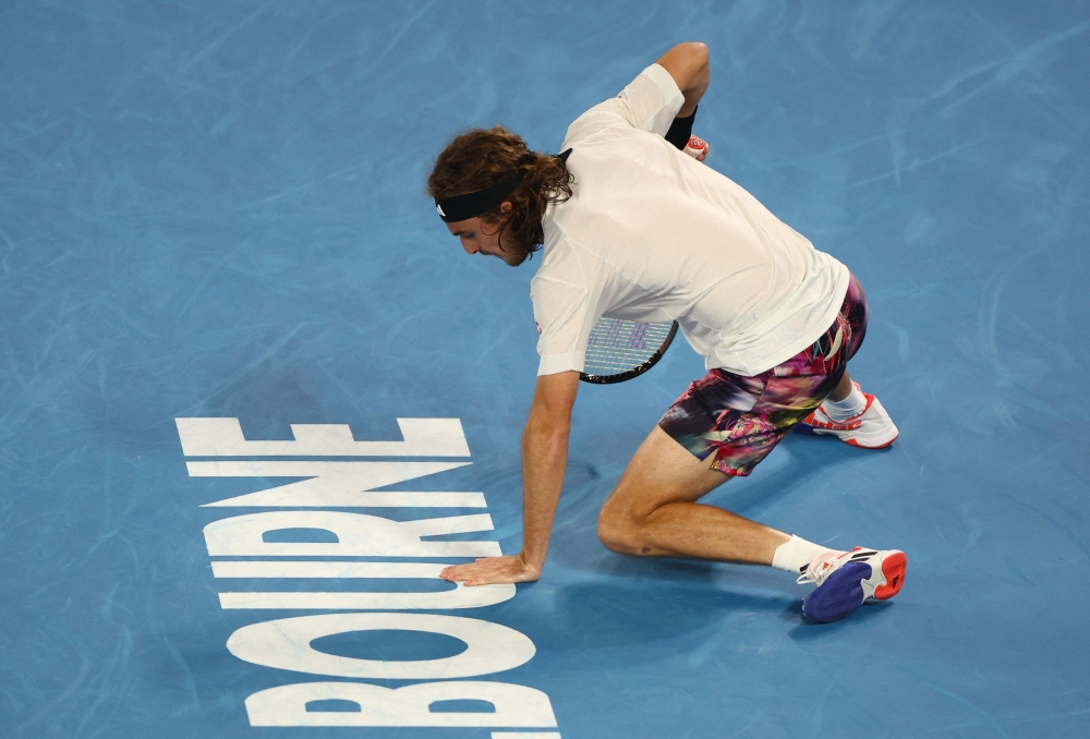 Greece’s Stefanos Tsitsipas celebrates winning his fourth round match against Italy’s Jannik Sinner during the Australian Open at Melbourne Park, Melbourne, January 22, 2023 ― Reuters pic