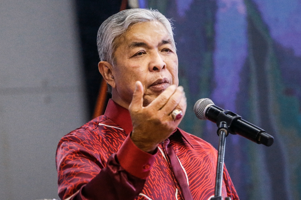 Datuk Seri Ahmad Zahid Hamidi said a report on the additional motion pertaining to the no-contest for the top two posts in the upcoming party poll needed to be approved to end the speculations raised by some disgruntled party members. — Picture by Hari Anggara