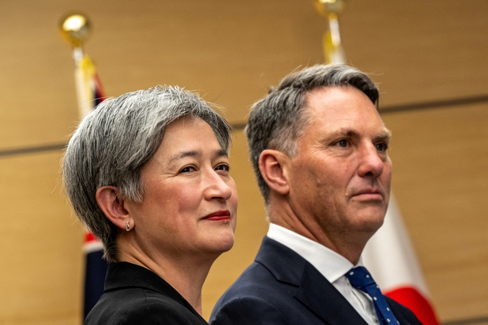 Australia's Foreign Minister Penny Wong and Australia's Defence Minister Richard Marles visit the Japanese prime minister's office during their visit to Tokyo, Japan December 9, 2022. — Philip Fong/Pool/Reuters pic