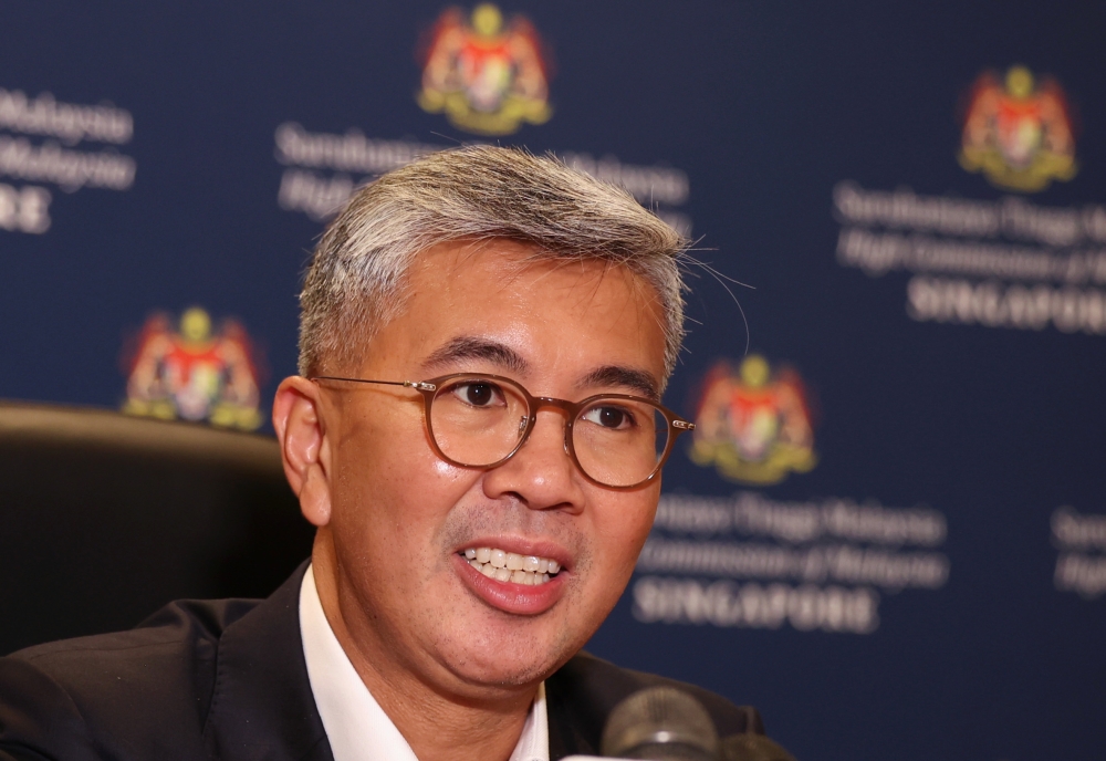 International Trade and Industry Minister Datuk Seri Tengku Zafrul Abdul Aziz speaks during a press conference after the signing ceremony of the Malaysia and Singapore Framework on Cooperation in the Digital Economy and Green Economy in Singapore January 30, 2023. — Bernama pic