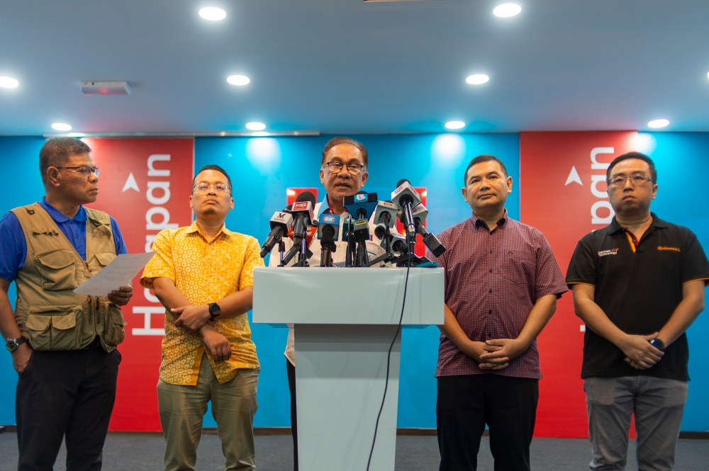 Prime Minister and PKR president Datuk Seri Anwar Ibrahim speaks to the media during PKR press conference at Keadilan headquarter in Petaling Jaya February 6, 2023. — Picture by Shafwan Zaidon