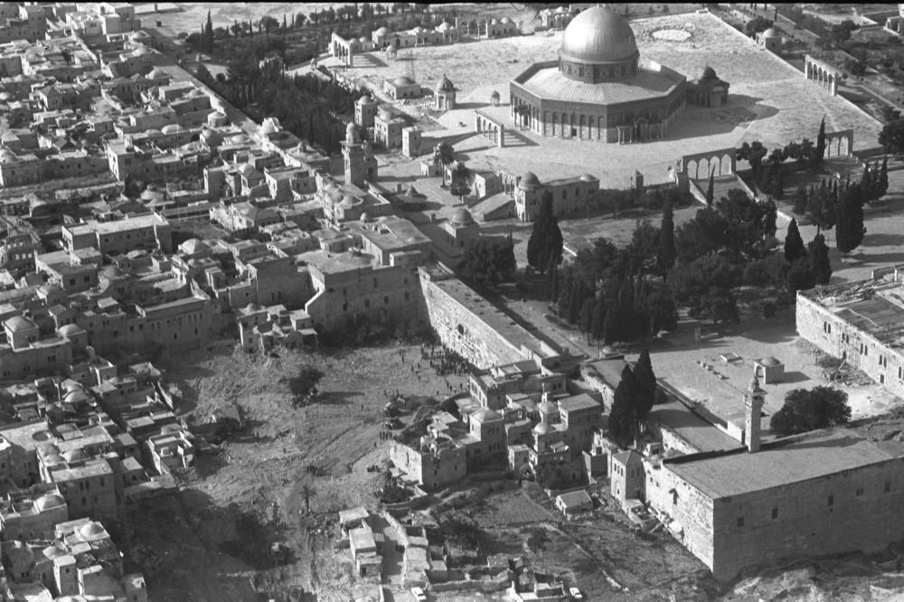 This file Israeli Government Press Office aerial picture taken on June 12, 1967 shows the remaining buildings in the Mughrabi Quarter in Jerusalem’s Old City by the Western Wall and the Al-Aqsa mosque compound following the Six Day War. — AFP pic