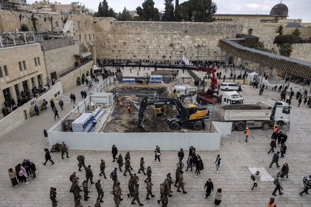 This file photo taken on January 15, 2023 shows a view of construction works conducted by the Western Wall Heritage Foundation to build an underground floor at the Plaza of the Western Wall. — AFP pic