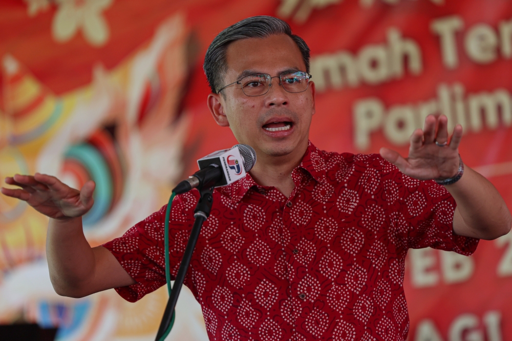 Communications and Digital Minister Fahmi Fadzil delivering a speech at the Lembah Pantai Parliament's Chinese New Year Open House at Taman Sri Sentosa in Petaling Jaya, February 12, 2023. — Bernama pic