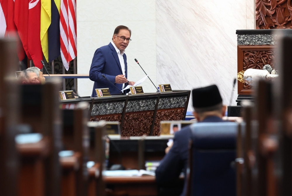 Prime Minister Datuk Seri Anwar Ibrahim speaks at the Parliament in Kuala Lumpur February 14, 2023. — Bernama pic