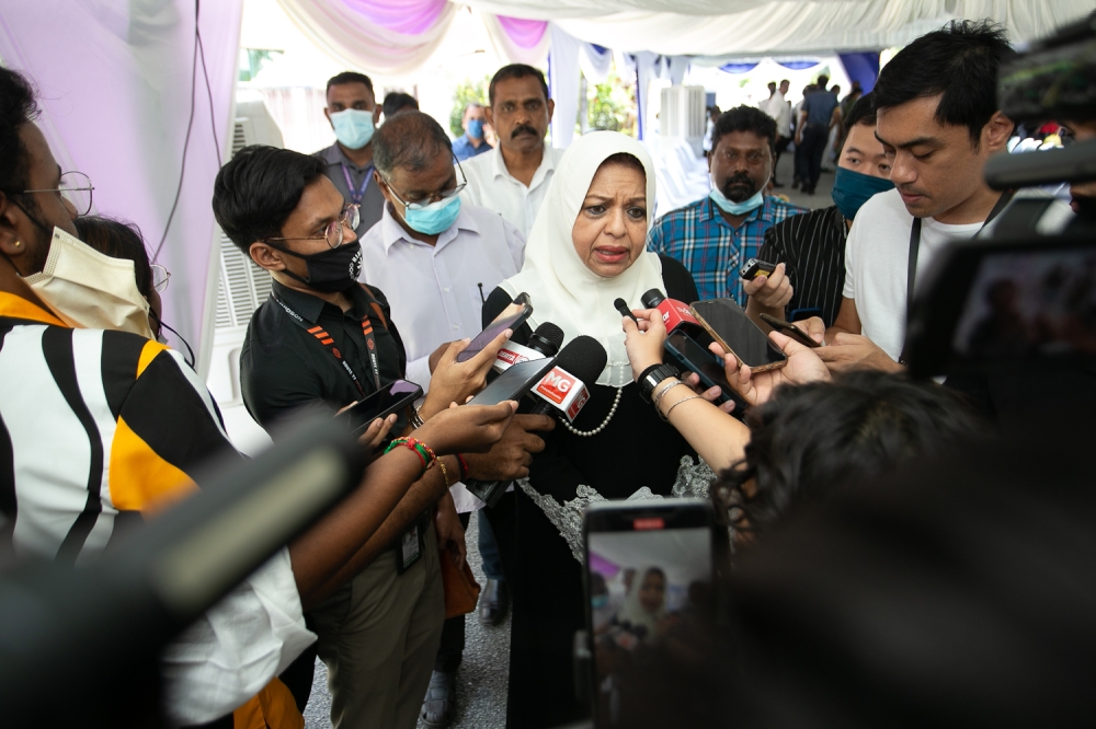 Tan Sri Shahrizat Abdul Jalil (centre) is likely to face off against incumbent Datuk Seri Noraini Ahmad who replaced her as Wanita chief in 2018 in the party polls next month. — Picture by Devan Manuel