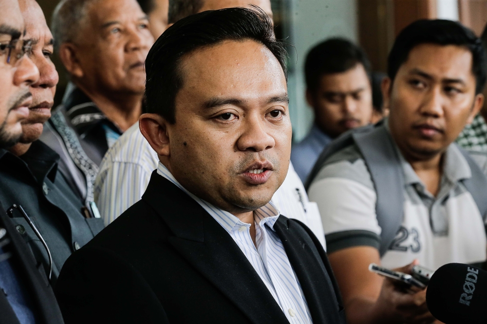 Bersatu information chief Datuk Wan Saiful Wan Jan speaks to the press after appearing at court due to MACC charges related to the Jana Wibawa project at Criminal Session Court, Duta Court Complex February 21, 2023. — Picture by Sayuti Zainudin