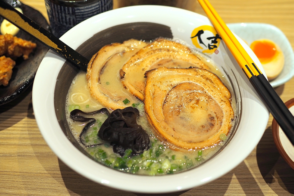 Try this satisfying bowl of ramen with a lighter 'tonkotsu' broth topped with their special 'chashu' and crunchy black fungus – Pictures by Lee Khang Yi