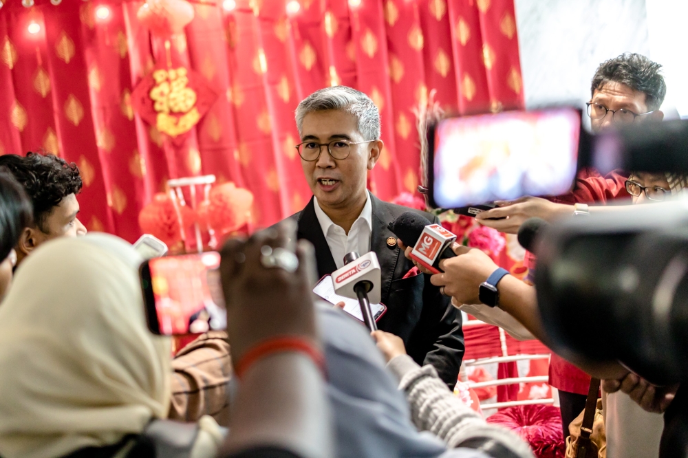 Minister of International Trade and Industry Tengku Datuk Seri Zafrul Abdul Aziz speaks to reporters at the Miti tower in Kuala Lumpur February 20, 2023. — Picture by Firdaus Latif