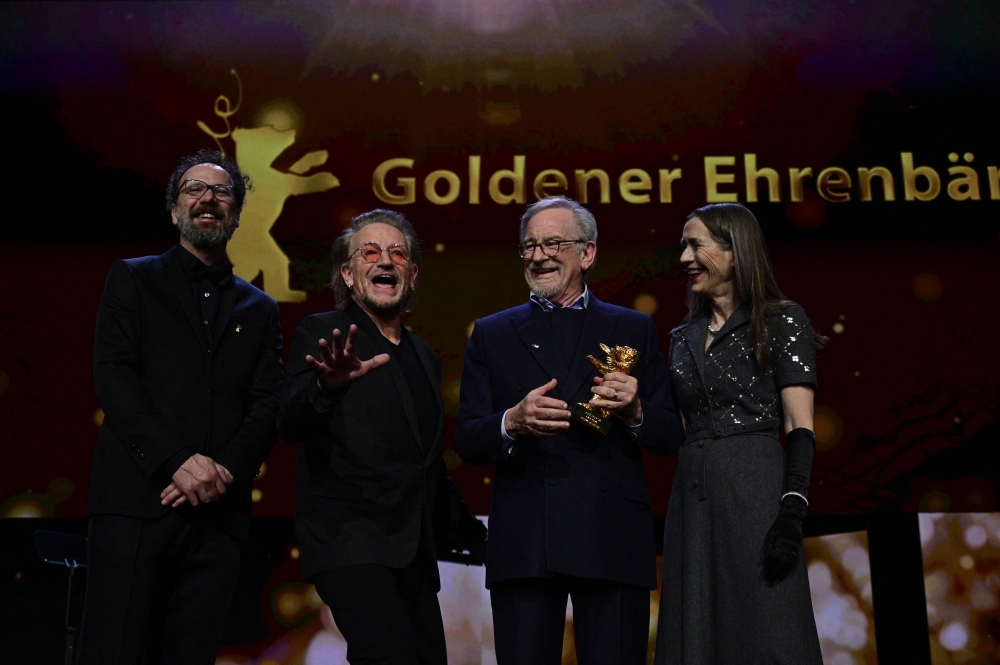 Berlinale Artistic Director Carlo Chatrian, Irish singer Bono, US director and producer Steven Spielberg and Berlinale Executive Director Mariette Rissenbeek pose after the Honorary Golden Bear ceremony and the premiere of his film ‘The Fabelmans’, presented as ‘Homage’ at the Berlinale, Europe's first major film festival of the year, on February 21, 2023 in Berlin. — AFP pic