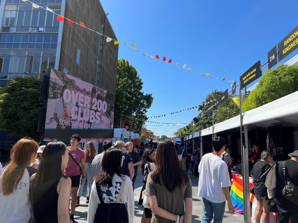 Students walk past stalls during the orientation week at The University of Sydney, in Camperdown, Australia February 15, 2023. — Reuters pic